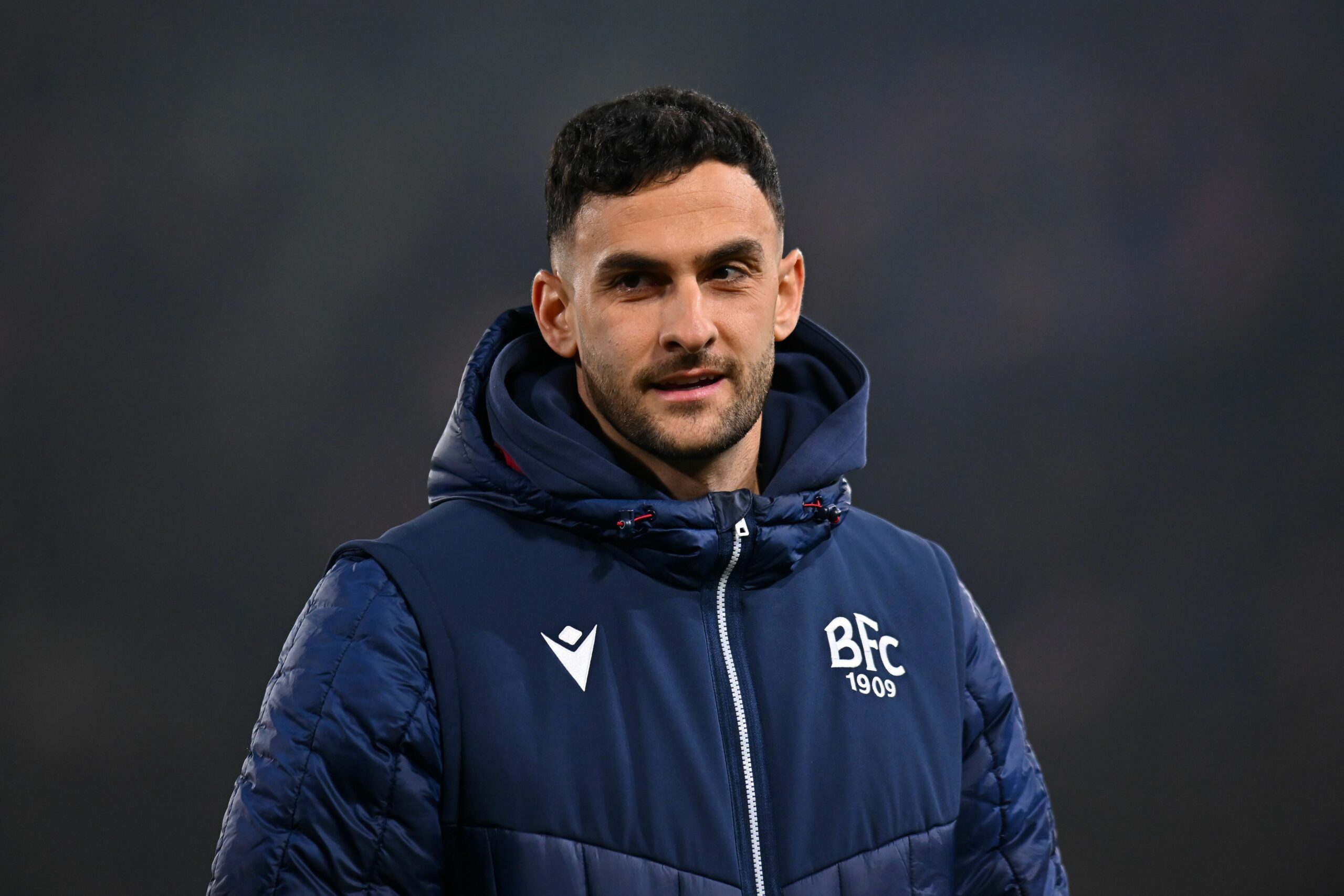 Bologna, infortunio per Lykogiannis contro il Parma: cosa è successo